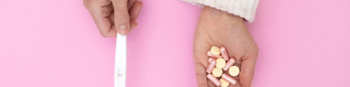 top-view-hands-with-pregnancy-test-pills (1)